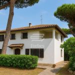 Detached villa for sale by the sea with pool and garden