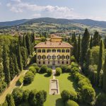 Historic home for sale with park and outbuildings in Tuscan hills