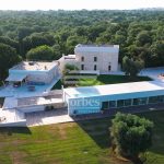 Prestigious Masseria with olive grove, swimming pool, and modern annexes with suites in Valle D'Itria Puglia